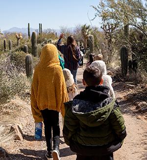 Kids walking along Desert Museum path